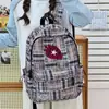Mochila de fresa muy elegante para mujer, mochila de viaje grande de estilo japonés con estrellas, diseño único, mochila escolar no convencional para estudiantes mujeres