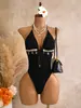 Traje de baño de una pieza de color liso, estilo nuevo europeo y americano para mujer 2026, cuello halter, sin tirantes, bikini de jacquard sexy para playa