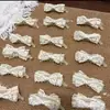 Puntos Blancos de EncajeEstilo delicado clip de plátano con lazo de lunares para coletas dobles, un hermoso clip de plátano