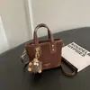 Bolso de hombro transfronterizo nuevo y moderno para el otoño de 2026, bolso cruzado de moda y versátil, elegante y práctico para ir al trabajo, bolso tipo cubo tote de alta calidad