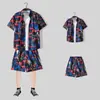 Camisa floral de manga corta, Ropa de playa de Hainan, Estilo hawaiano de Sanya, Conjunto de pantalones cortos finos de verano para hombre y pareja de viaje a Tailandia