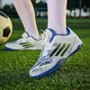 Nuevos zapatos de fútbol bajos para niños con botones giratorios, diseño sin cordones, adecuados para entrenamiento de fútbol sala y correr