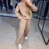 2024 Europa e Estados Unidos transfronteiriços outono e inverno explosões feminino casual gola redonda manga longa corpo inteiro perfuração quente corda toe terno de duas peças