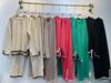 Otoño 2023 Nuevo elegante color de contraste abertura moda casual manga larga tejido cintura alta adelgazante pantalón de pierna ancha conjunto de dos piezas
