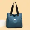 Bolso tote grande de tela Oxford para mujer 2026 nuevo, estilo simple para ir al trabajo, bolso de hombro multibolsillo, al por mayor