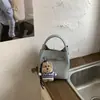 Bolsa de Mão Retrô Transfronteiriça para Mulheres Moda Primavera 2026 Bolsa Saco Design de Nicho Bolsa Transversal para Mulheres Conjunto