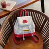 2026 Mochila Escolar Mini Linda Estilo Universitario Transfronteriza Mochila Infantil de Moda Mochila Cuadros Bordada Linda Estilo Japonés