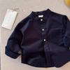 Camisa Crema Primavera 2025 Nueva Llegada Coreana Niños y Niñas Cuello Redondo Camisa Rayada Bebé Linda Camisa con Bolsillo Trendy