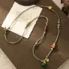 2026 Collar Retro de Cuerda Tejida a Mano con Cuentas de Acero de Titanio para Mujer Diseño de Nicho Estilo Étnico Cadena para Suéter Accesorios de Flor