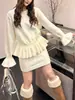 Conjunto de Tricô com Babados de Luxo para Mulheres, Novo Estilo Primavera 2026, Suéter que Marca a Cintura e Saia de Cintura Alta Conjunto Moderno de Duas Peças