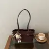 Bolso retro mate de alta gama para mujer 2026 nuevo elegante versátil bandolera única bolso de axila bolso de mano tote bolsa cubo