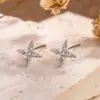 Elegantes y compactos aretes de estrella de cuatro puntas con incrustaciones de circonita para el uso diario, simples y elegantes studs para el lóbulo y accesorios de ear cuff