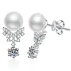 Pendientes de plata de ley S925 con moissanita pendientes de perlas de agua dulce corona femenina color D 60 pendientes de moissanita femenino al por mayor