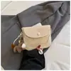 Novo modelo de outono de 2026, único e estiloso, bolsa de celular requintada, bolsa de ombro e transversal portátil, bolsa quadrada pequena de design nicho