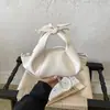 Envío transfronterizo de bolsos de mujer de gran capacidad, nuevo diseño casual de nicho de verano 2026, bolso de hombro y bandolera para mujer para el día a día