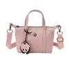 Nuevo Bolso Cruzado de Hombro para Mujer Primavera Temprana 2026 Lona de Nylon Color Macarrón Moda Casual