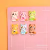 Juguete de comida miniatura simulada lindo gato accesorios de resina DIY pegamento de crema funda de teléfono pasador material de decoración kit