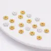 Cuentas espaciadoras DIY al por mayor, espaciadores de copo de nieve, soportes de flor de 14K, accesorios de cuentas budistas, accesorios de cuentas de color dorado para collares, pulseras y artículos decorativos