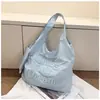 Bolsa de Mão Estilo Coreano Estilo Preguiçoso Bordado de Letras Estilo Artístico para Mulheres 2026 Novo Modelo Bolsa de Ombro Grande Capacidade Bolsa de Axila