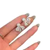 Pendientes de botón de encaje con lazo y perla súper etéreos, estilo nicho de lujo ligero, diseño de alta gama, pendientes de moda al por mayor