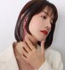 Anillo de dedo estilo europeo y americano con diseño de nicho, cadena torcida, chapado en oro de 18 quilates y titanio, joyería personalizada para mujer.