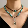 Venta Caliente Transfronteriza Nuevo Estilo Collar Apilado para Mujer Estilo Occidental Cactus Sombrero de Cabeza de Toro Cadena para el Cuello de Franela Turquesa en stock