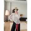 Elegante camiseta de tricô de linho listrada em duas cores com decote V para mulheres, outono de 2026, top casual solto de manga comprida