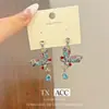 Pendientes de Mariposa de Diamantes Coloridos de Lujo Ligero Estilo Francés, Diseño de Nicho con un Toque de Alta Gama, Pendientes de Botón Largos y Únicos Exagerados de Alta Resistencia para Mujer