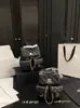 Mochila de corrente estilo Chanel 23p, novo modelo de verão 2025, padrão lichia caviar, mochila pequena de couro genuíno de alta qualidade