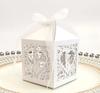 Caja de dulces de boda europea, caja de dulces de boda creativa hueca con láser, caja de chocolate rosa, venta al por mayor de Shenzhen