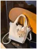 Bolso Único Texturizado Bolso Tote Pequeño para Mujer 2026 Nuevo Bolso Cubo Simple Versátil Bolso de Hombro Cruzado Bolso de Moda
