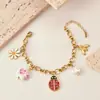 Conjunto Série de Insetos Personalizado Transfronteiriço Brincos de Joaninha de Plástico Vermelho e Preto Pulseira de Crisântemo Pequeno Colar de Clavícula Atacado