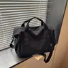 Bolsa de viaje corta de otoño transfronteriza, bolsa de almacenamiento de equipaje de mano de gran capacidad, bolsa ligera para el día a día para mujer, bolsa para deportes y fitness