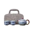 Conjunto de chá de porcelana azul e branca cultural e artístico no estilo Ruyao, uma chaleira e quatro xícaras, conjunto de chá de viagem portátil, presente de luxo leve de alta qualidade