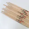 Juego de Batería Tambor Tarola Baquetas de Batería Baterismo Profesional Baquetas de Madera Maciza Venta al por Mayor Práctica Rendimiento Antideslizante Arce 5A Baquetas de Batería