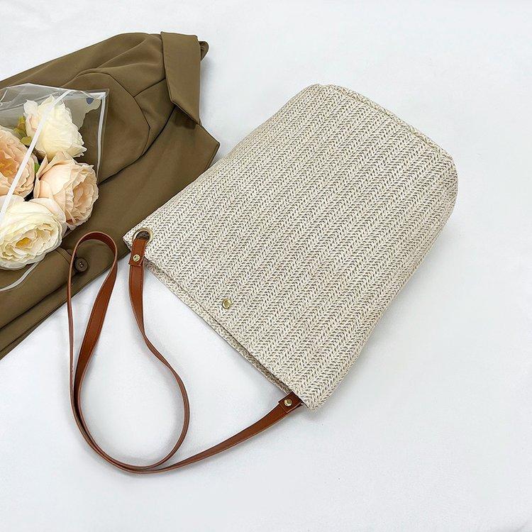 编织包女包新款潮2024夏草编简约百搭小清新水桶包个性单肩斜