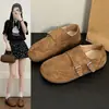 Populares zapatos planos para mujer estilo británico, nuevo modelo otoño 2026, sandalias planas casuales para exteriores estilo Birkenstock con correa de hebilla