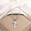Collar de acero de titanio acero inoxidable para niños cadena retorcida de alto sentido doble cruz moda todo partido colgante que no se decolora