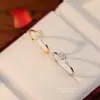 Anillo de camelia francés vintage de plata pura s999 para mujer, versátil y único, elegante anillo abierto de plata de ley al por mayor