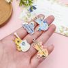 Colgante de aleación de aceite de 6 gotas para violonchelo guzheng, accesorios para instrumentos musicales, joyería artesanal, accesorios para colgar, materiales, venta al por mayor transfronteriza.