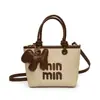 Bolsa de Mão Tecida com Design de Nicho de Pedido Estrangeiro Cor Contrastante Feminina 2024 Nova Versátil Casual Ombro Transversal Bolsa Balde