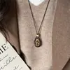 Collar Colgante Ovalado de Piedra Ojo de Tigre Vintage Maillard Cadena Elegante de Clavícula de Moda Collar de Nicho de Alta Gama para Mujer
