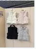 Nuevo Chaleco de Otoño/Invierno 2026 Chaleco con Cuello Alto Chaqueta de Plumas Sin Mangas Tejido de Punto Patchwork Adelgazante Favorecedor Chaleco para Mujer de Moda