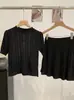 Nuevo Top de Punto Hueco de Manga Corta Estilo Francés para Verano 2026, Blusa de Mujer Versátil a la Moda de Corte Ajustado en Rosa para el Trabajo