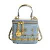 Bolsa mini personalizada para labiales transfronteriza 2026, nueva bolsa cruzada tachonada primavera/verano, bolso de hombro versátil y de moda para mujer