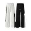 Marca de moda Jiayiku Otoño 2025 Nuevos Pantalones Deportivos Retro Americanos de Bloques de Color para Hombres y Mujeres Holgados, Caídos, de Pierna Ancha