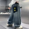 Jeans para niños para primavera y otoño 2026 nuevo estilo coreano pantalones de otoño para niños pantalones rectos de moda para niños mayores venta al por mayor