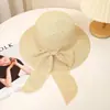 Chapéu de sol transfronteiriço feminino com laço chapéu de pescador proteção solar chapéu de palha chapéu de papel aba larga chapéu de praia chapéu casual atacado