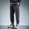 Nuevos pantalones de chándal jogger transfronterizos para hombre, estilo primavera y otoño, pantalones largos casuales holgados, pantalones deportivos de moda estilo americano, pantalones casuales