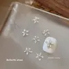 Mariposa Aleación Pedrería Acabado Blanco Flor de Cinco Pétalos Corbata de Moño Accesorio de Pedrería para Uñas Estilo Lujo Ligero Lazo